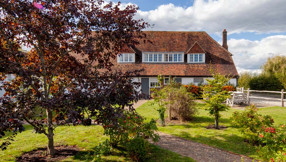 Three converted barns located around a communal garden – The Old Barn, The Long Barn and The Little Barn – with a total of seven bedrooms.