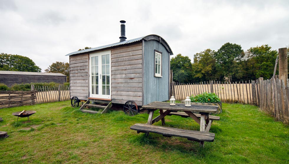 The shepherd’s hut includes a double bed, a small kitchen to make simple meals, plus a bathroom with a shower, sink and toilet.
