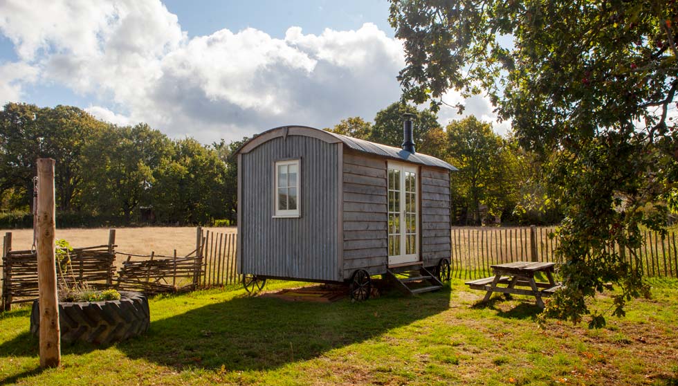 The shepherd’s hut includes a double bed, a small kitchen to make simple meals, plus a bathroom with a shower, sink and toilet.